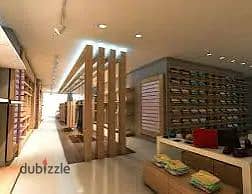 Commercial shop for rent 90 m suitable for any commercial activity, super lux finishing with all facilities, water, electricity, and bathroom in Alexandria, Al-Ajmi, kilo 21, October street, before the gate, in a very distinguished location.
