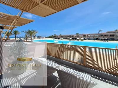 Chalet for sale in Azha village, finished with air conditioning and kitchen in the best location with a lagoon view.