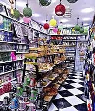 70 m commercial shop for rent suitable for any commercial activity, super lux finishing, all facilities available: water, electricity, and natural gas, in Alexandria, Al Agamy, kilo 21, the main October street, before the gate in a very distinguished location
