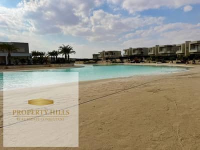 Chalet for sale, finished with air conditioning and kitchen, with a lagoon view next to Foka Bay at a price lower than its original.