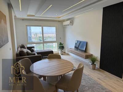 Available furnished apartment for rent in Madinaty, featuring special finishing in a prime location next to all essential services.