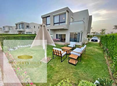 Chalet for sale in Marina 5, completely finished with furniture, appliances, and air conditioning, with a down payment of 7 million