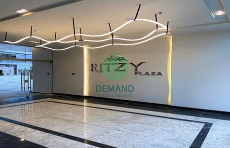 Office 64 meters fully finished with Ac's  for rent in Ritzy Mall directly on Al Shabab Street El Sheikh Zayed