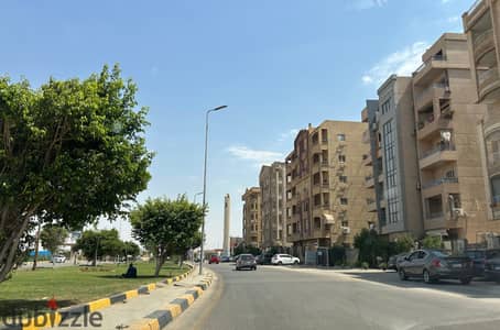 Apartment for Sale in Obour City, located on the main Khat 10 Road, next to Orabi Association and directly opposite Imam Mosque, with a very attractive view.   Very close to all essential services, Creative Mall, Obour General Hospital, and all means of