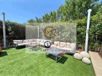 Ground floor apartment for sale with a large garden, sea view, and excellent payment plans over 12 years in Saray Royal Residence.