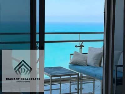 eLowest price for Hotel apartment in The Gate El Alamein with Panoramic Sea&lagoon view Finished with hotel services Over12Years Steps from THE G Hote