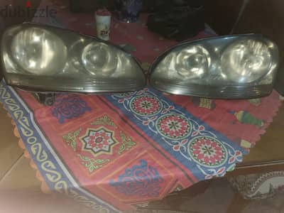 بحالة الزيرو  طقم  فوانيس  جولف 5 وجيتا أصلي