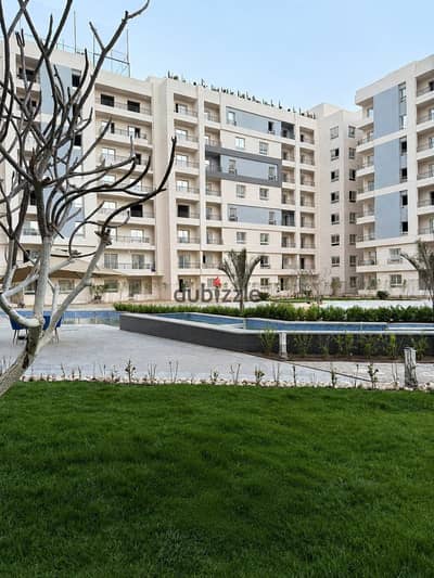Receive your apartment with a down payment of 10% at Al Mondo, the administrative capital, near the Swedish University, Ben Zayed Axis, and essential services.