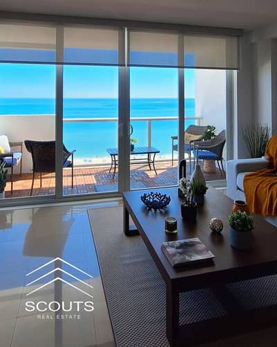 Apartment for sale, first row directly on the sea, immediate occupancy, finished with air conditioning, in El Alamein Towers, North Coast, next to Rix