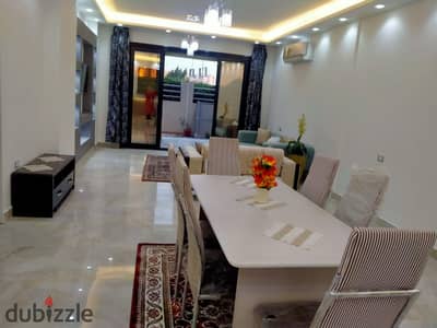 للإيجار داخل Midtown – New Cairo، بحديقة خاصة، وتشطيب وفرش كامل