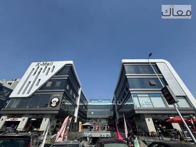 Ground-floor shop, immediate delivery, 26m + 21m outdoor area, rented for EGP 50K/month + 3BR apartment, zero down payment, South 90th. Ground-floor shop, immediate delivery, 26m + 21m outdoor area, rented for EGP 50K/month + 3BR apartment, zero down payment, South 90th.