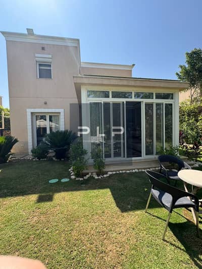 Villa for sale with ultra-super-lux finishing, open view overlooking the landscape, prime location within Mivida Compound - Emaar