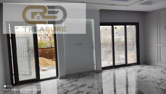Apartment with garden for sale in Eastown - new cairo