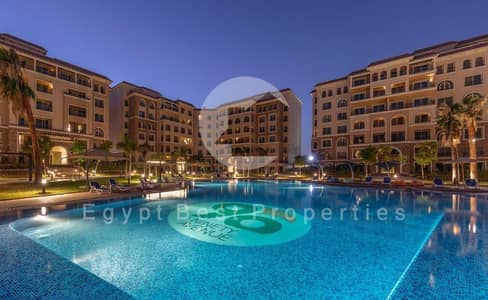 Ground-floor apartment with garden, fully finished with ACs, open view, on Teseen St. opposite AUC, New Cairo. Direct owner.