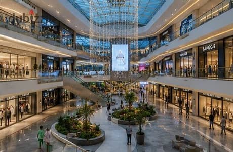 بمقدم 228الف هتمتلك محل للبيع اول مول في R5 العاصمة الإدارية بعاقد مضمون 100% واجهة مباشرة على البرج الأيقوني