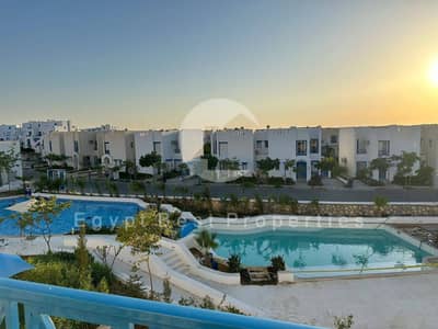 Premium 2-Bedroom Chalet in Mountain View Ras El Hekma, fully finished with ACs, lagoon view, next to Modon, North Coast.