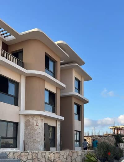 Two-bedroom chalet finished with a view of the sea in the North Coast Compound next to Sodic