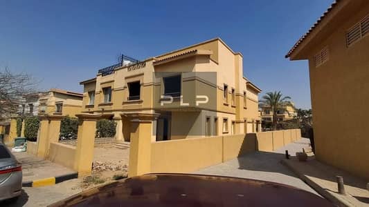 Townhouse villa for sale, fully finished and ready for immediate occupancy, in La Terra Compound - Fifth Settlement - with a landscape view.