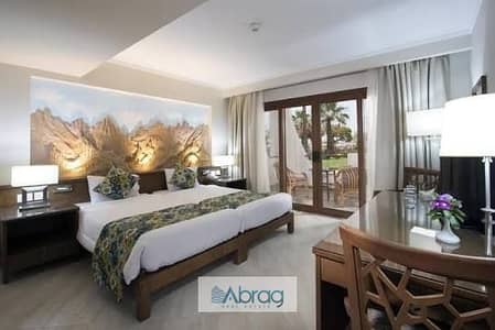 Hotel apartment 60m furnished on Al-Nuzha Road in front of Al-Ahly Club managed by Swiss Inn, 10% down payment, 10 years installment
