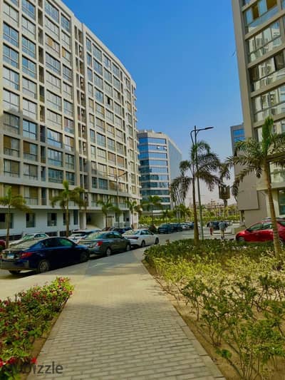 Apartment for sale in Compound One Qattameya 190 meters half finishing with the garage
