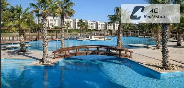 باقل توتال في الماركت لسرعه البيع شاليه ارضي بجاردن ريسيل فوري140متشطيب كامل Open view في امواج الساحل الشمالي بتقسيمه مميزة جاهز للمعاينه و الاستلام