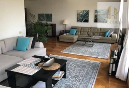 Luxury fully furnished apartment for rent in Katameya Heights, Fifth Settlement, New Cairo.  Featuring a direct golf view, high-end finishing