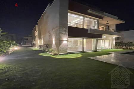 Ready To Move Standalone villa overlooking a green space in The Crown Palm Hills near Golf Views , New Giza , Swan Lake