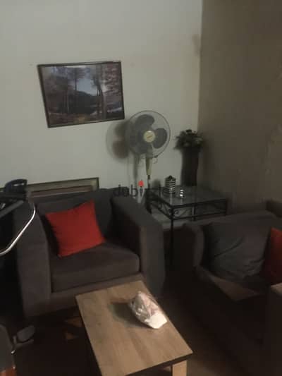 Rooftop furnished studio for rent branching off Nasr Street with air conditioning