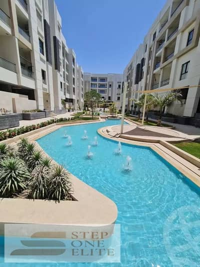 Ultra-super-lux finished hotel apartment in front of Madinaty, directly on the Suez Road, available with installments.