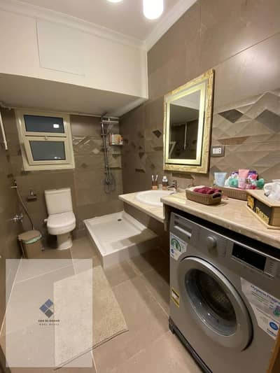 Apartment for sale in the First Settlement, Youth Housing, 70 square meters, two rooms, ultra-super luxurious finishing, second floor, prime location next to Al-Rehab, Suez Road, and Al-Miraj, and first number.