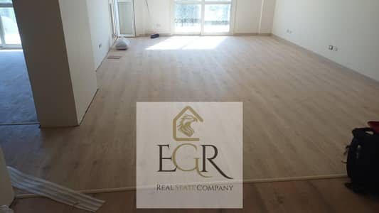 Apartment for rent, empty, legal, in Madinat Al-Rehab, next to Avenue Mall, 99 meters, special finishing, garden view