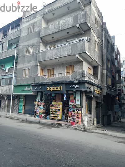 ارض ومبنى للبيع بالعجمى-طريق اسكندرية مطروح