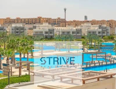 With 16,500 monthly fully finished chalet with private garden prime double View Lagoon and Sea In north coast Sidi Abdel Rahman For sale