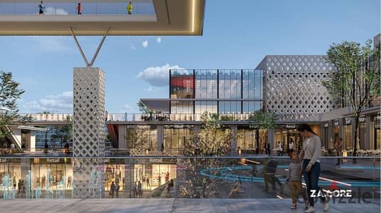 For sale, a 45 sqm office in The Core Mall, one of the most important and best projects in Sheikh Zayed, directly on the Dahshour link, with a high investment return, a down payment of 1%, and installments of up to 8 years.