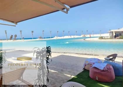 Villa for sale in Marbella with a 5% deposit only, with a sea view and lagoon, and finished with air conditioning and kitchen in an investment village with dollar returns.