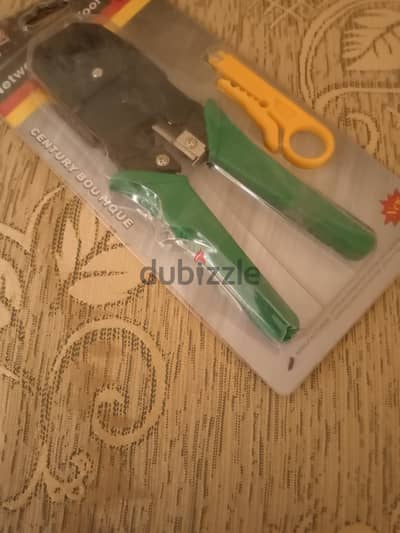 أراجه لتقطيع وتقشير الاسلاك جديده لم تستخدم