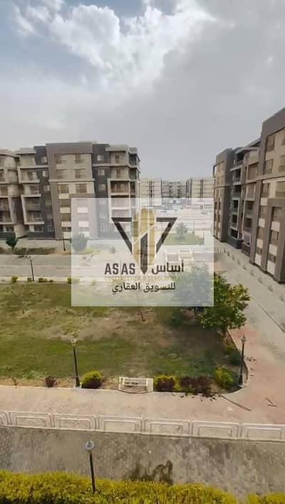 Apartment for sale in Compound Jannah New Cairo next to Dar Misr Al-Andalus, the American University, Mivida, and the South Ninety
