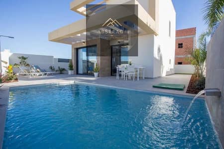 Villa in a prime location with a direct sea view + private pool in the North Coast with a 245m garden near Silver Sands Sidi Heneish and Almaza Bay