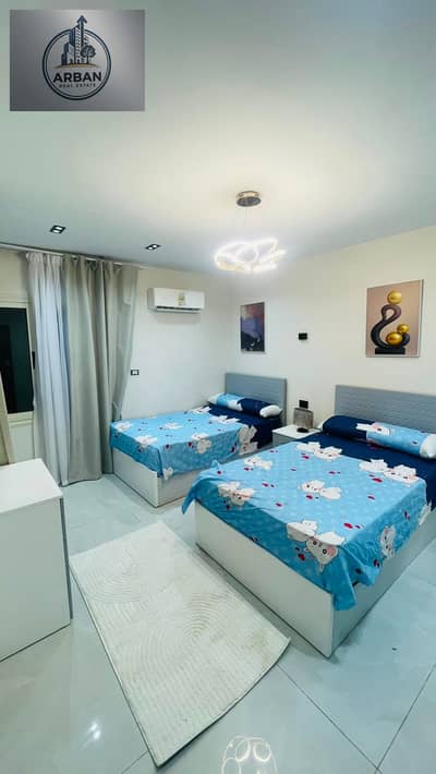 For rent, a furnished hotel apartment in Degla Maadi, 203 Street, next to Degla Square and 233 Street, a prestigious and distinguished location.