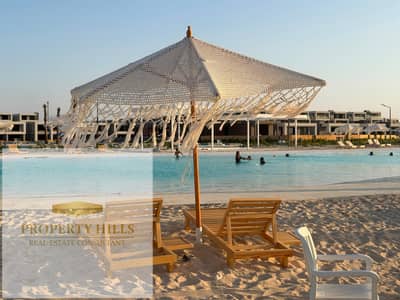 Ground floor chalet, 125 sq m, with a lagoon view, by El Abd, fully finished. Price reduced from original for quick sale.