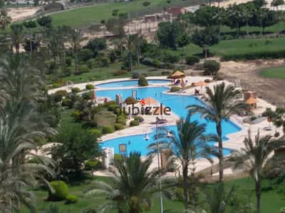 At the lowest price in the market, a two-bedroom chalet with 2 bathrooms in Golf Porto Marina with a swimming pool view and direct landscape.