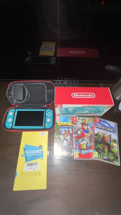 Nintendo Switch Lite (Turquoise) + 3 Games + Full Accessories Set