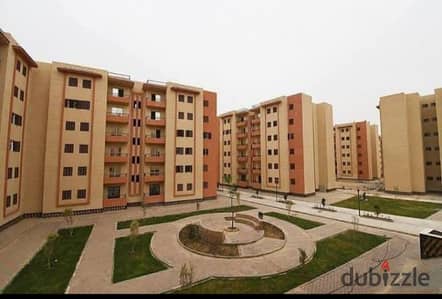 Apartment 90 m in 6 October, October Gardens, in front of the device, elevated ground floor, secure, unblocked