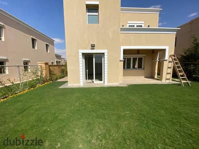 For rent in Mivida Compound  villa with a kitchen ACs units and appliances located directly on South 90th Street and near the AUC in 5th Settlement