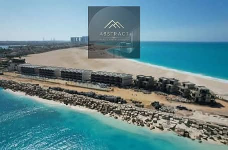 Townhome for sale, immediate delivery in Marina 5 (Lisan Al-Wazara), triple view at the initial offering price, and delivery with a down payment only