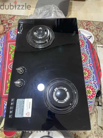 بوتاجاز بلت ان جديد مسطح غاز IKON زجاج أسود 2 شعلة  إشعال ذاتي