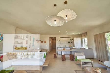 A finished chalet with a 25% price reduction, with a sea view in direction white, featuring a high coastal community.