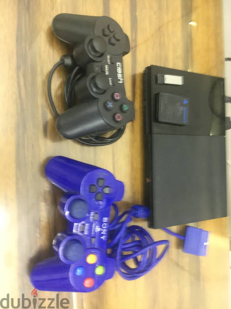 Playstation 2 Slim (Exclusive Controllers) 1