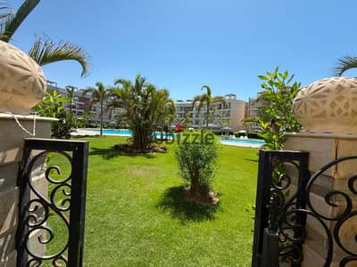 For sale chalet in Marsilia Beach 4, there is a wave barrier, area of 80 meters with a garden, two rooms with pool view including furniture