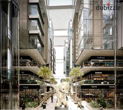 Shop for sale in installments on the central axis in October overlooking the monorail in Ninth Hub Mall with a 10% discount